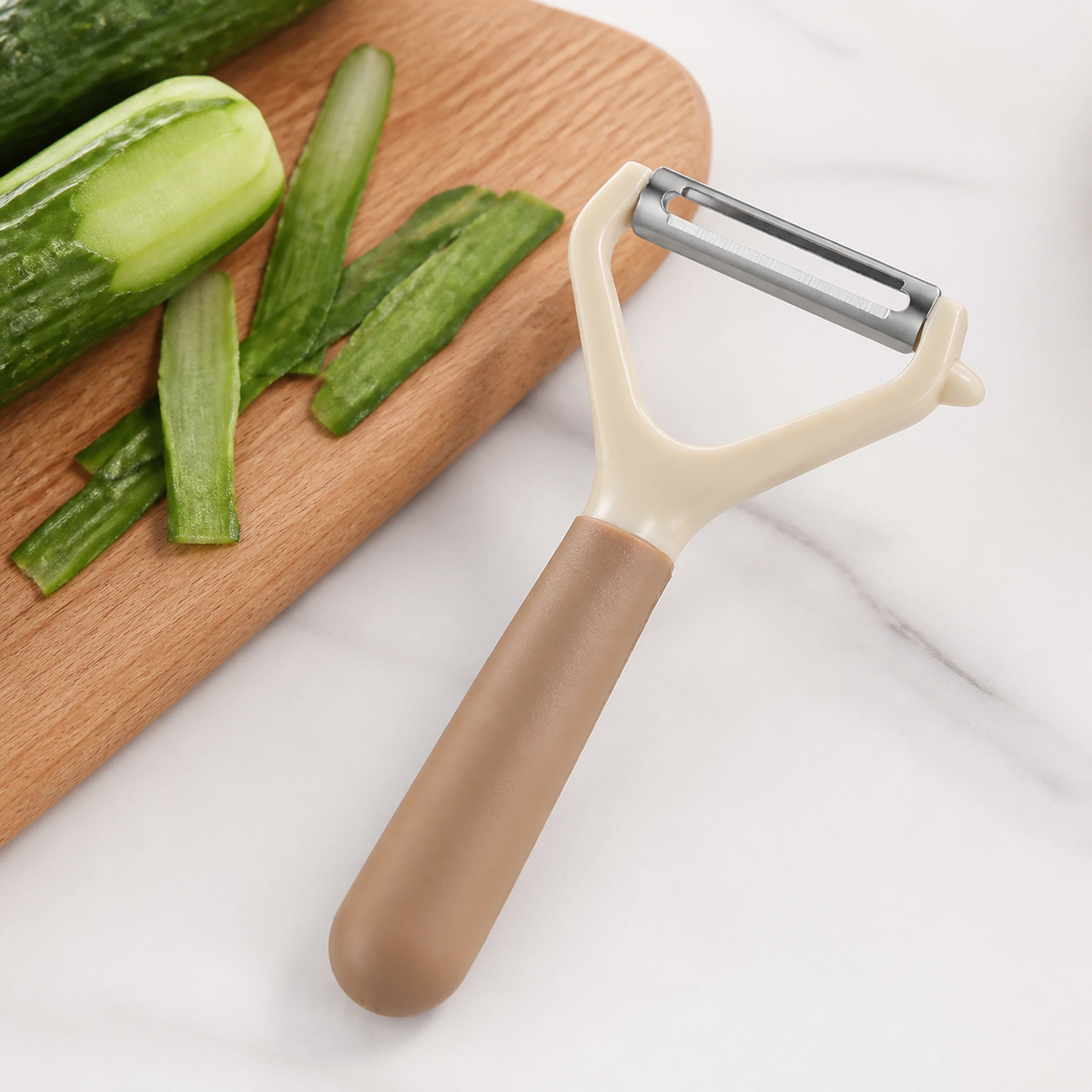 Pelador de plástico para frutas y verduras plásticol image 1